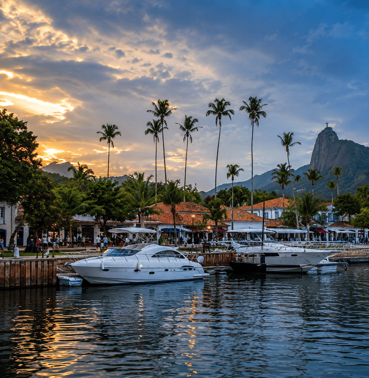 Passeio de iate privado no Rio de Janeiro com marina, barcos de luxo, palmeiras e vista panorâmica ao entardecer